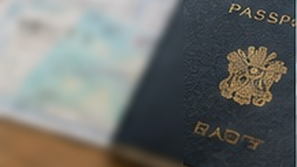 Blurred passport and supporting documents for a Japanese bank account application