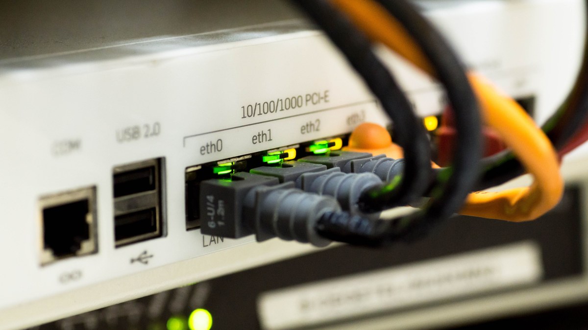 Ethernet ports and network cables connected to home internet equipment