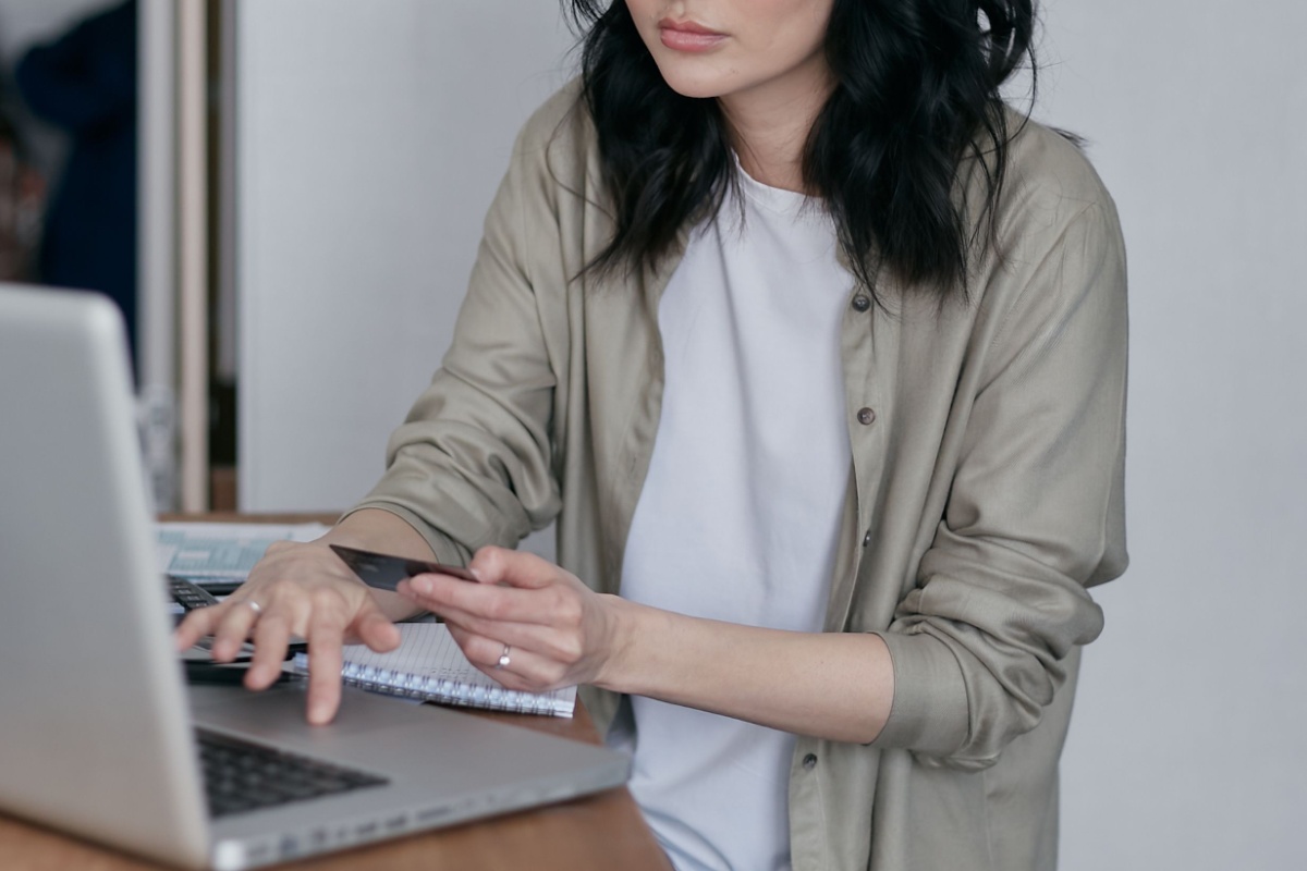 Resident paying household utility bills online