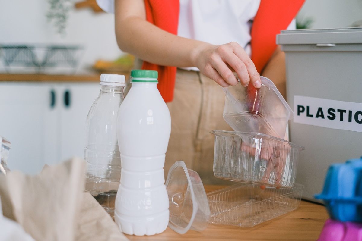 Plastic bottles and containers being sorted for recycling