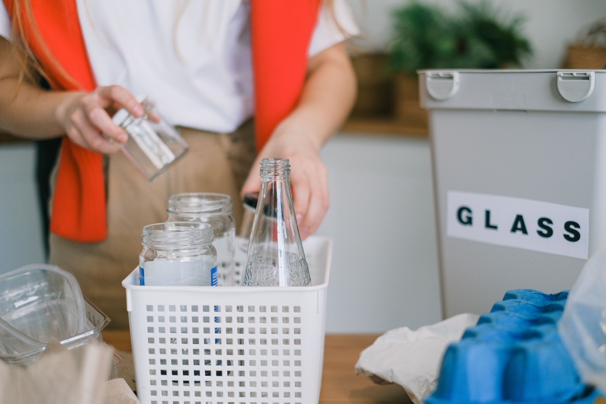 Glass bottles and jars being separated for recycling