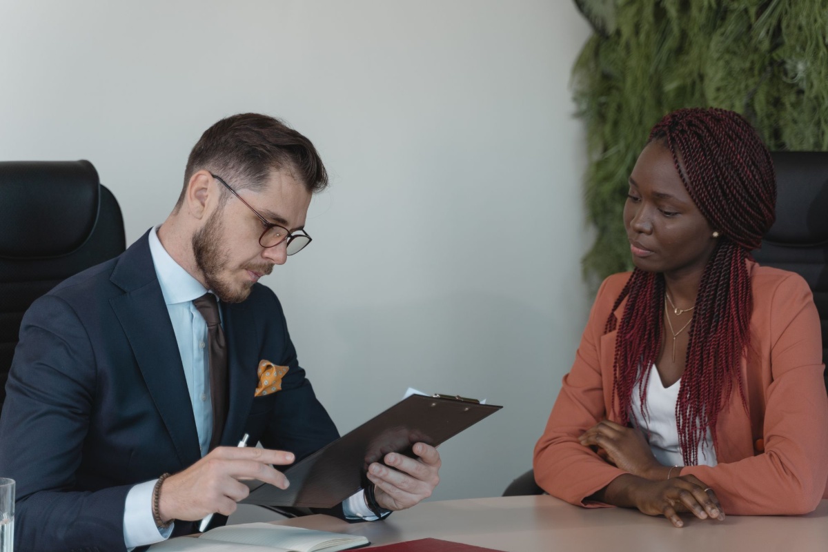 Candidate speaking with an interviewer during a professional job interview