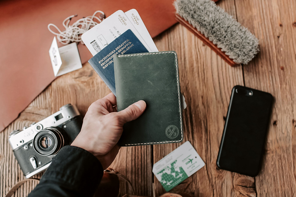 Passport and documents prepared for a residence card reissuance application