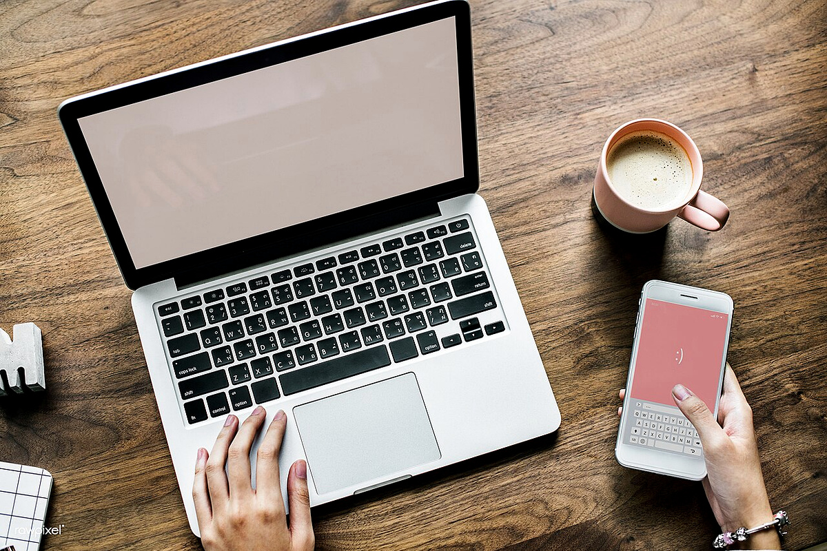 Laptop and smartphone prepared before calling a Japanese office