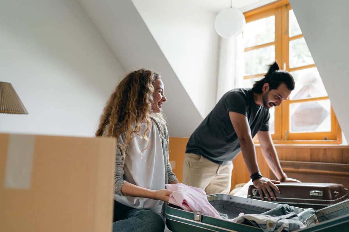 Residents moving into a furnished short-term apartment