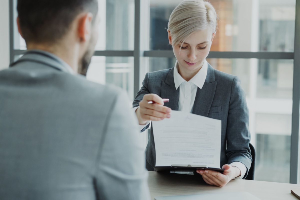 Client discussing tax documents with a professional adviser