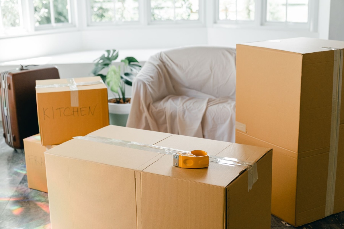 Packed moving boxes in an apartment before move-out