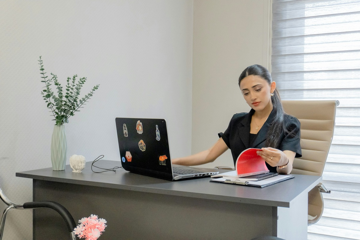 Resident organizing a document folder before an immigration application