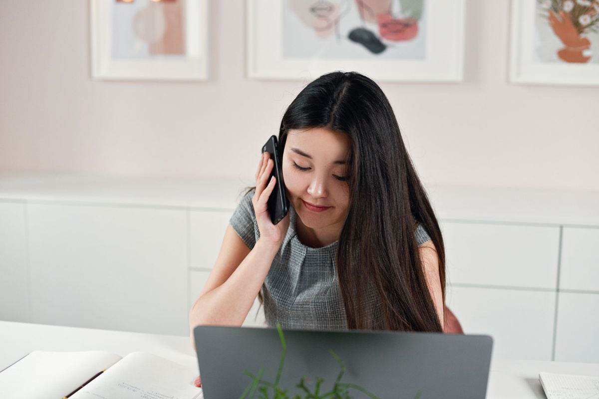 Resident listening carefully to a Japanese automated phone menu