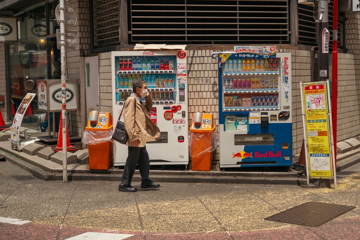 Business professional walking through Tokyo after completing residence procedures