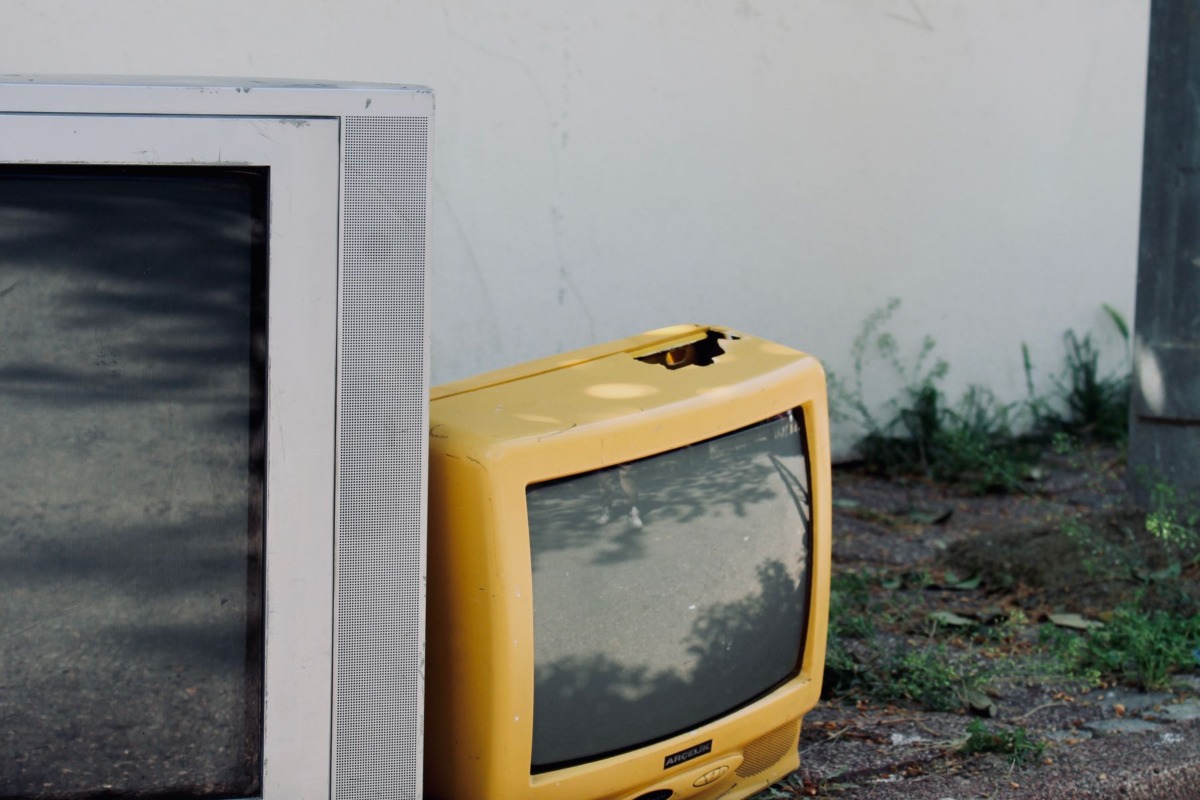 Old televisions awaiting proper recycling or disposal