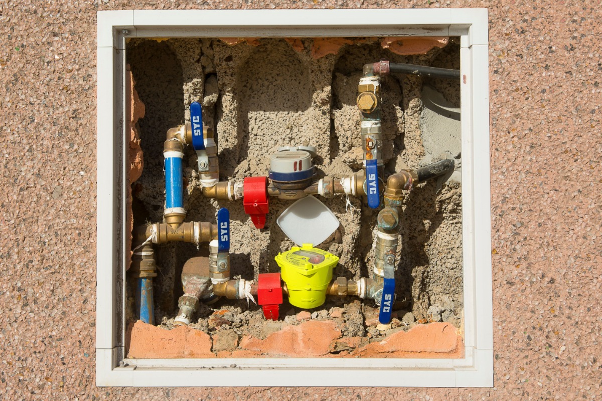Water meter and pipes used to measure household water consumption