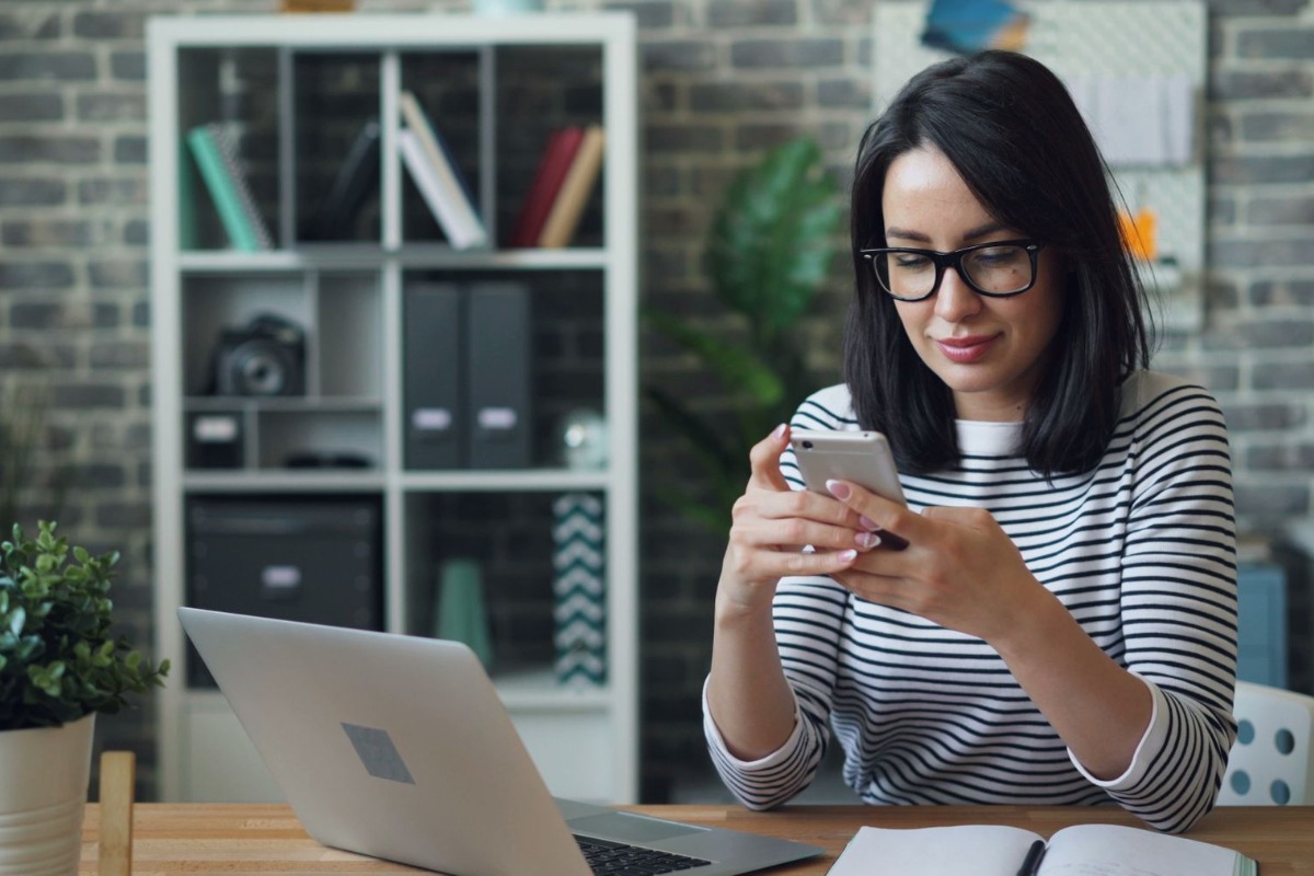 Office worker checking salary information on a smartphone