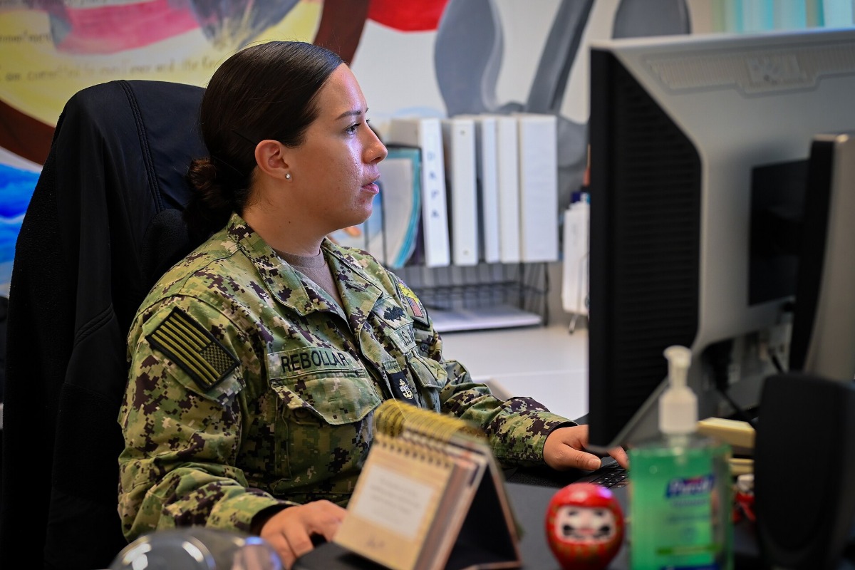 Career counselor reviewing employment paperwork