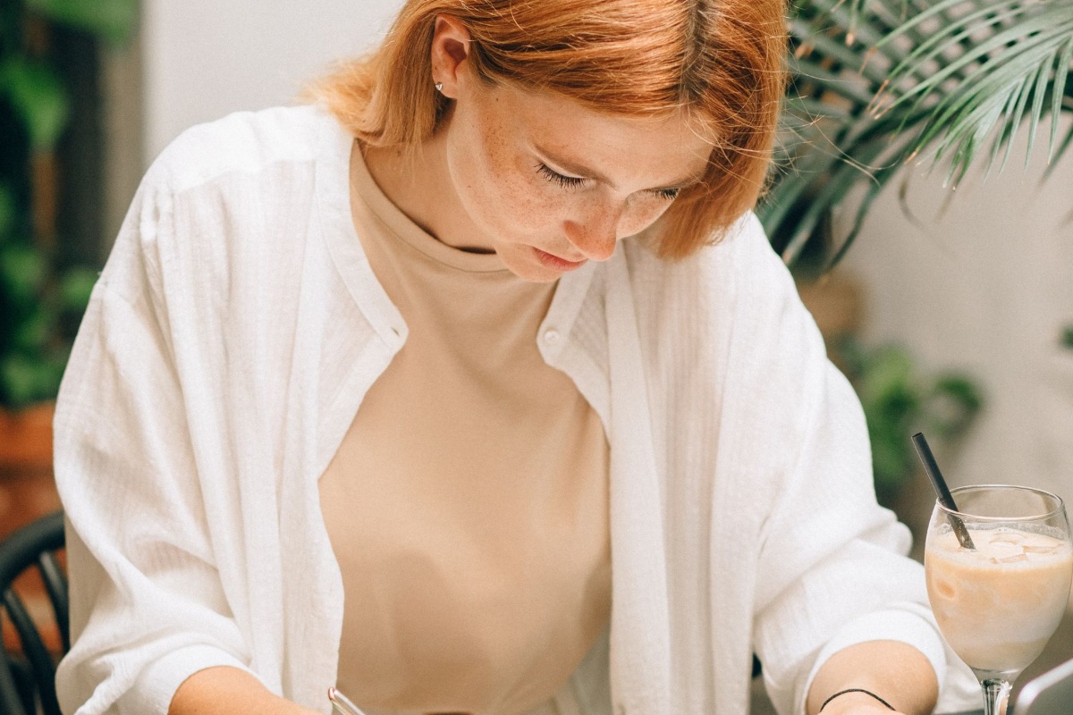 Person reviewing banking records and transaction details