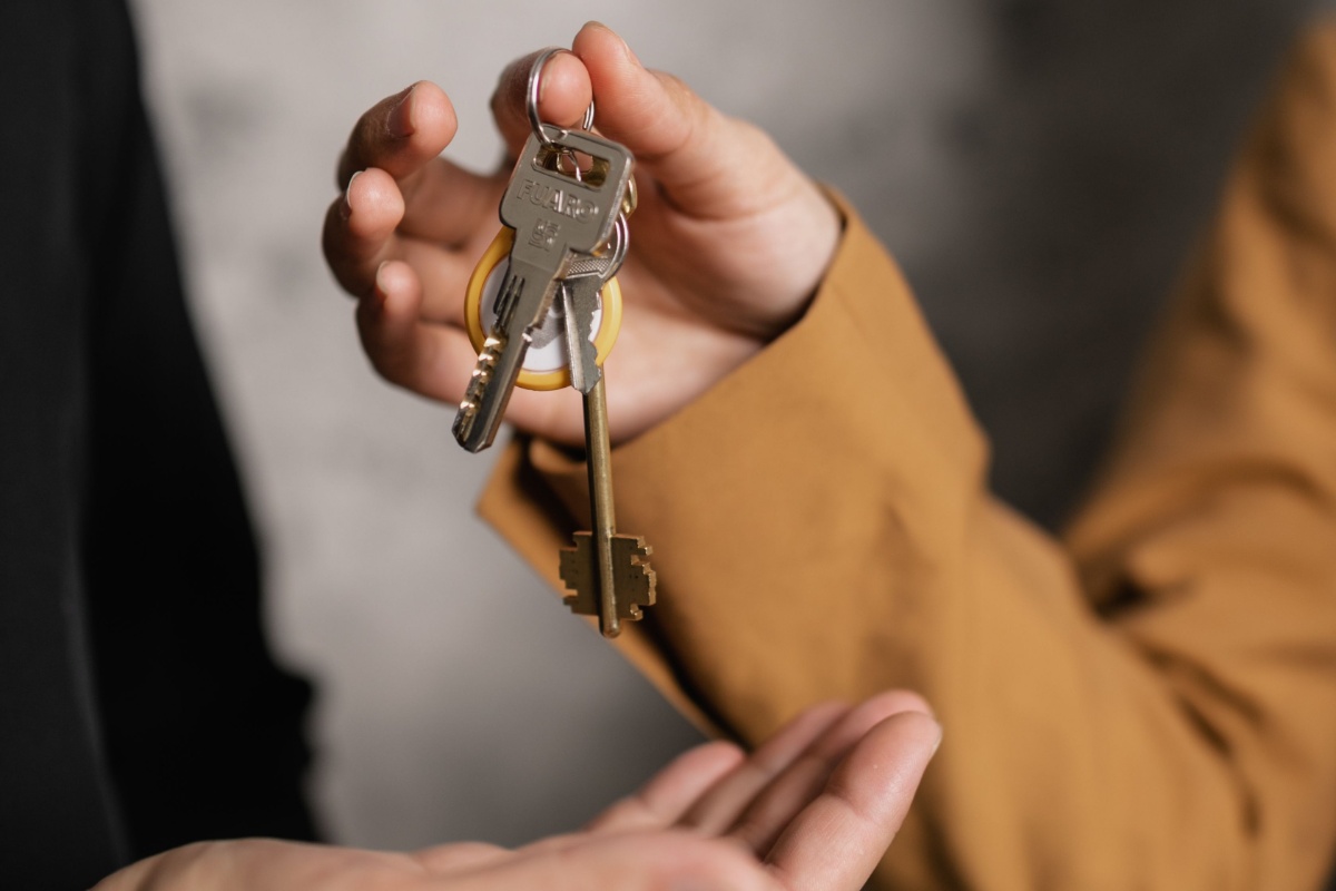 House keys being handed to a renter