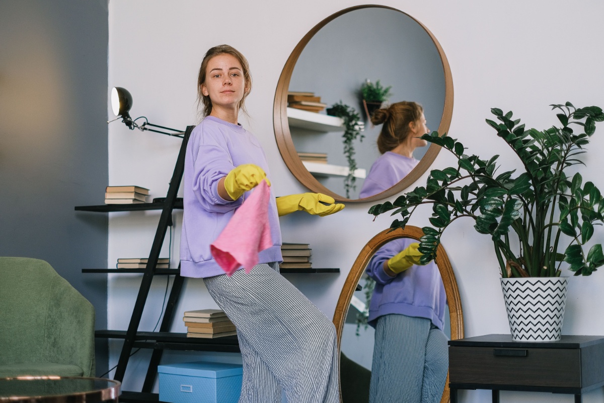 Resident cleaning an apartment before the move-out inspection