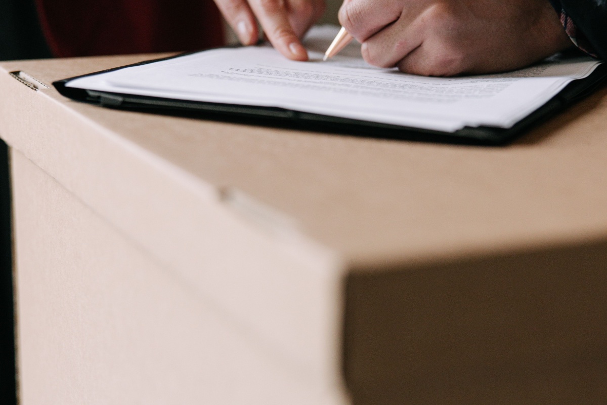 Address paperwork being completed during a house move