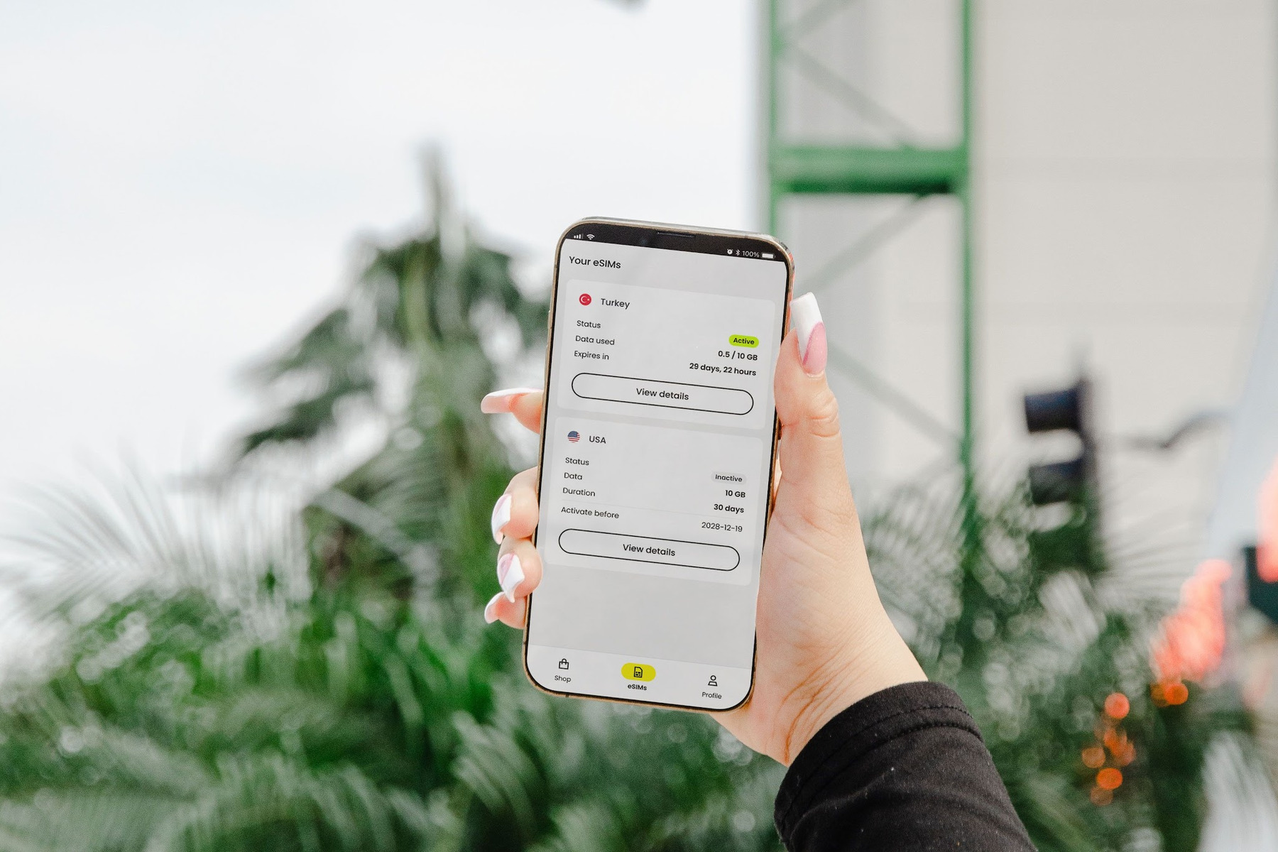 Smartphone showing installed eSIM plans and activation details